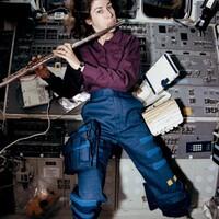 Thumbnail for Ellen Ochoa, STS-56 mission specialist, takes a brief time out from a busy day in space to play a 15-minute set of flute music on the space shuttle Discovery’s aft flight deck