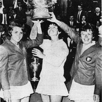 Photograph from left to right: the United States national tennis team members Carole Caldwell Graebner, Julie Heldman, and Billie Jean King in Turin, Italy, holding the Federations Cup trophy